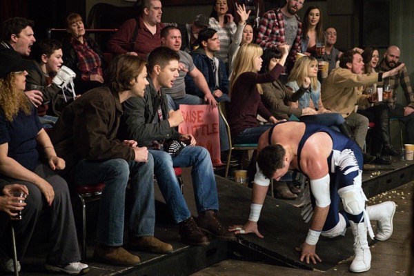 Supernatural: Beyond the Mat - Dean and Sam sit in the stands and cheer on fallen wrestler Gunner Lawless