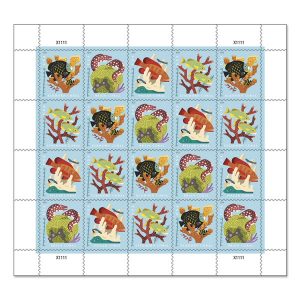A smaller sheet of stamps with four illustrated coral reef designs in a pastel blue background