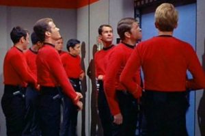 Star Trek redshirts loiter in a corridor. If they tried wearing safe cosplay contacts, their eyes would probably all explode or something.
