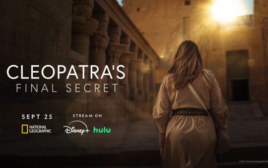 Kathleen Martinez ascends the temple to a bright sun