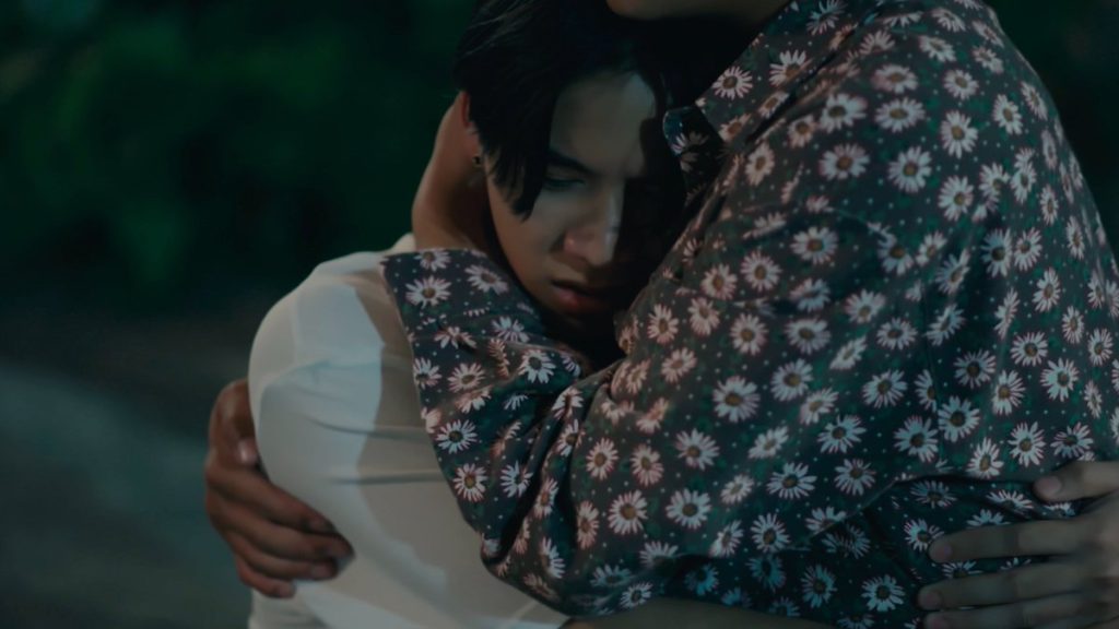 Lava cradles Wave to his chest after Wave breaks down crying.