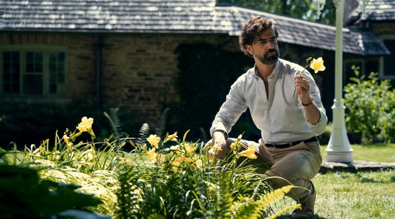 Cipher from Gen V selects a yellow flower from his yard. (Image via Amazon Prime Video)