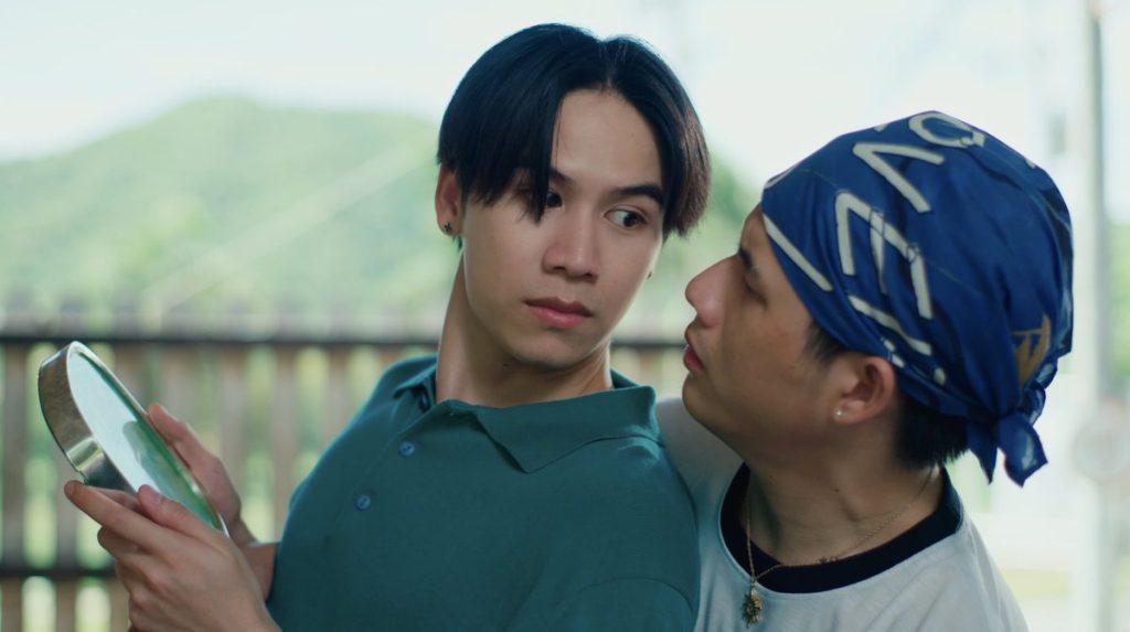 Wave, holding a wall clock, has fallen backwards off the stepladder into Lava's waiting arms.