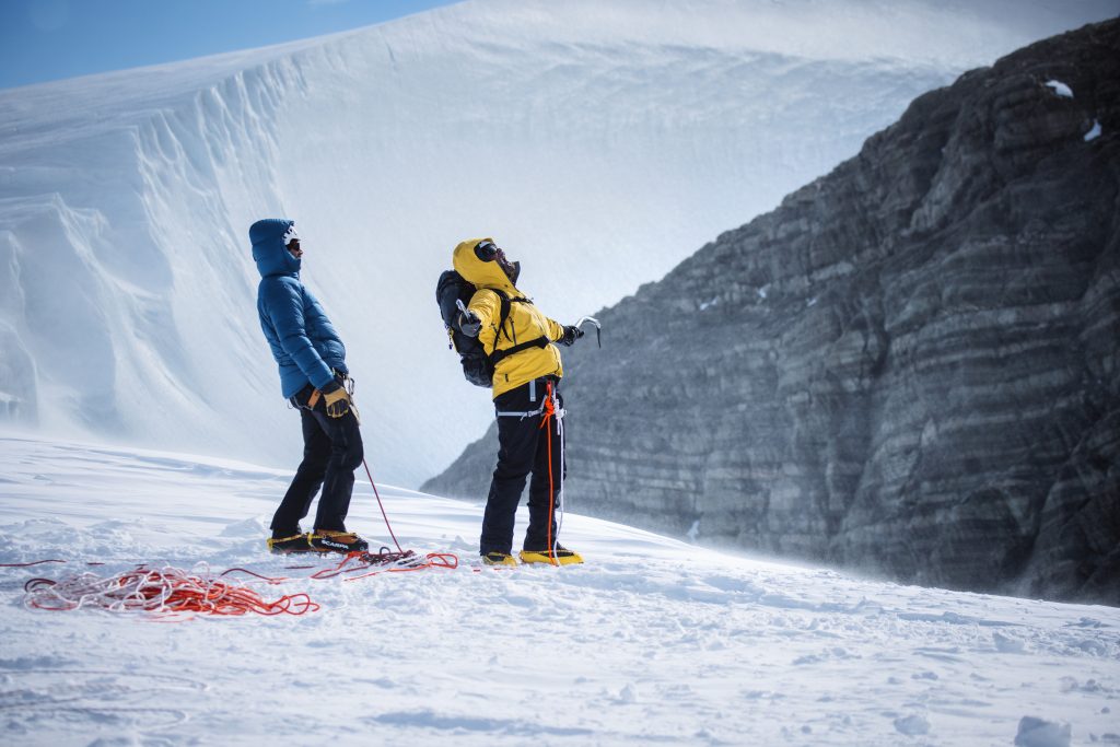 Will Smith makes it to the top of a 300 foot ice wall. 